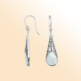 Silver teardrop earrings featuring Mother of Pearl and ornate Bali scroll patterns.